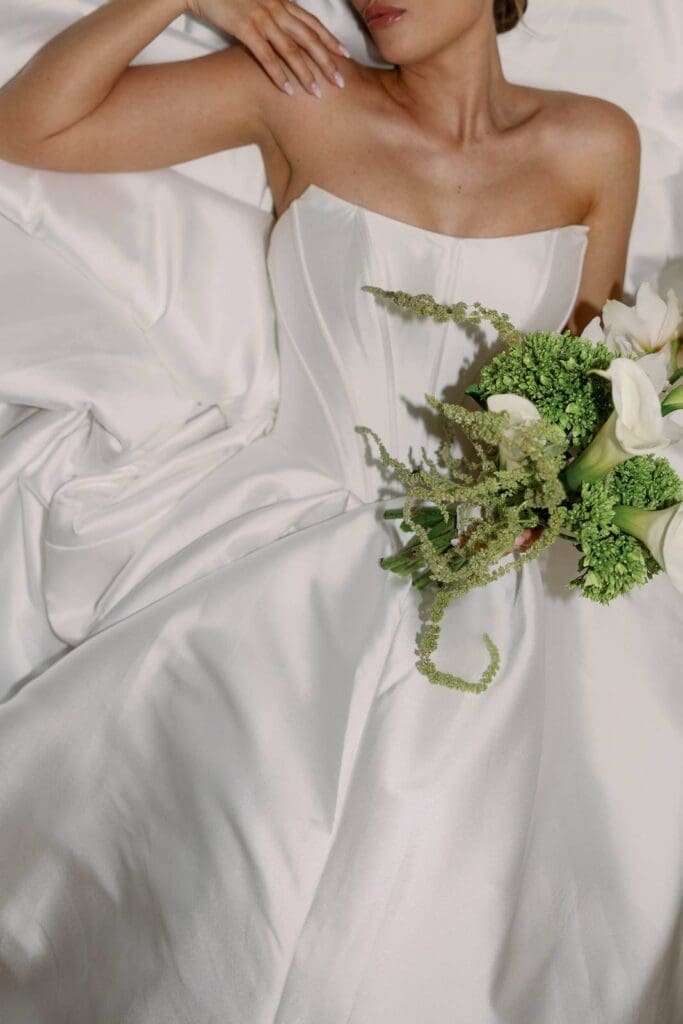 George Peabody Library wedding with minimalist gown and bridal bouquet