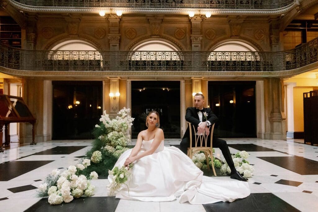 George Peabody Library wedding bride and groom posed on iconic floor