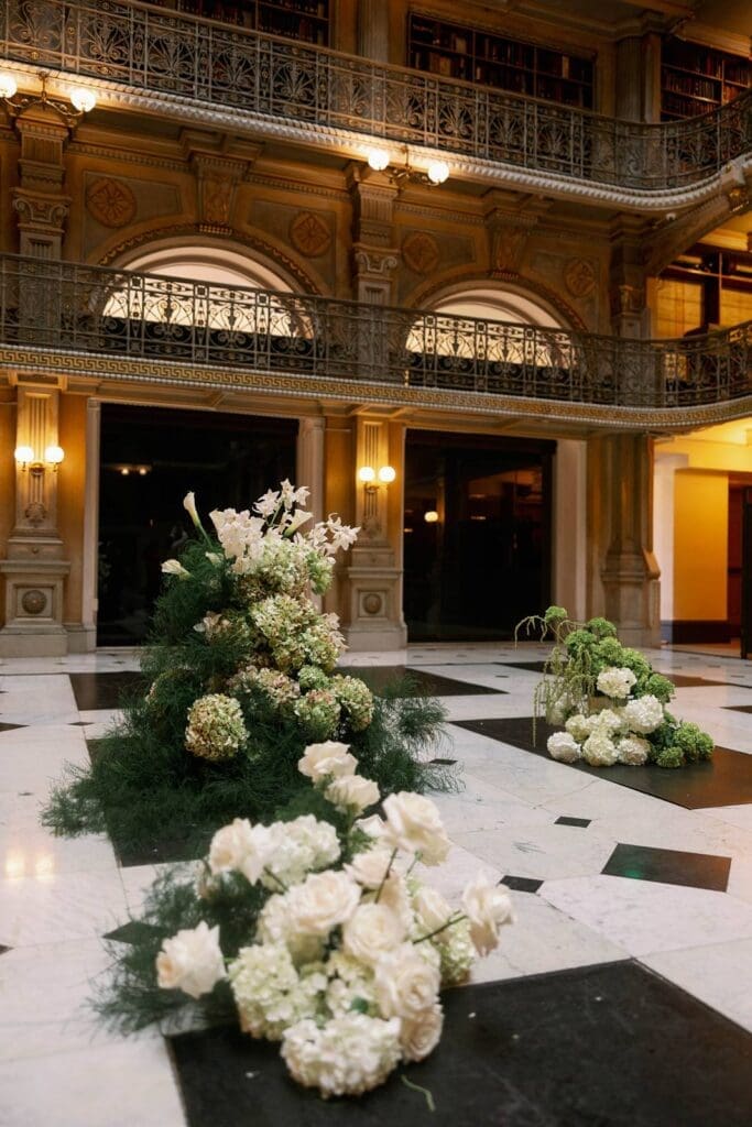 George Peabody Library wedding with elegant floral arrangement
