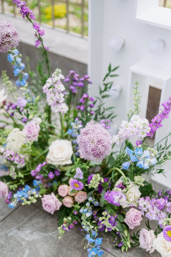 whimsical floral arrangement for upscale rooftop party in alexandria