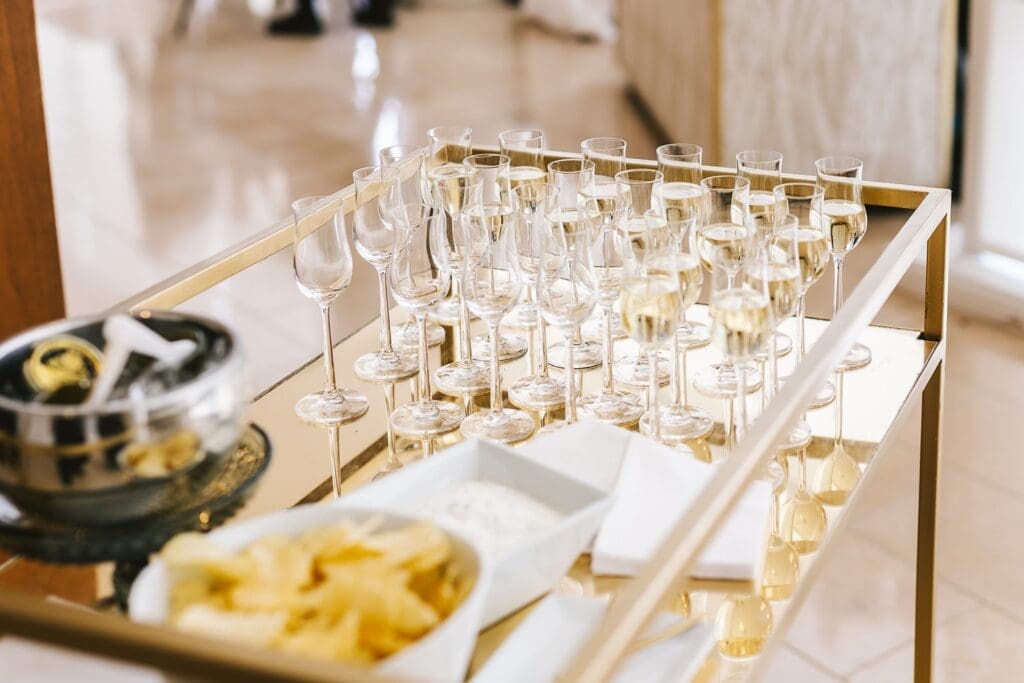 four seasons baltimore party with champagne and caviar on a gold cart