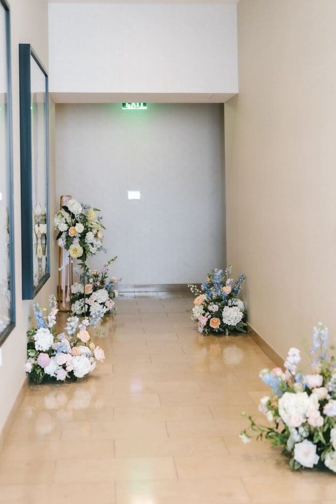 whimsical pastel florals align the hallway