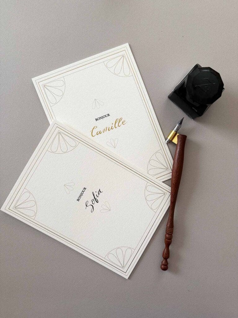 calligraphy on personalized menus with gold ink and with black ink