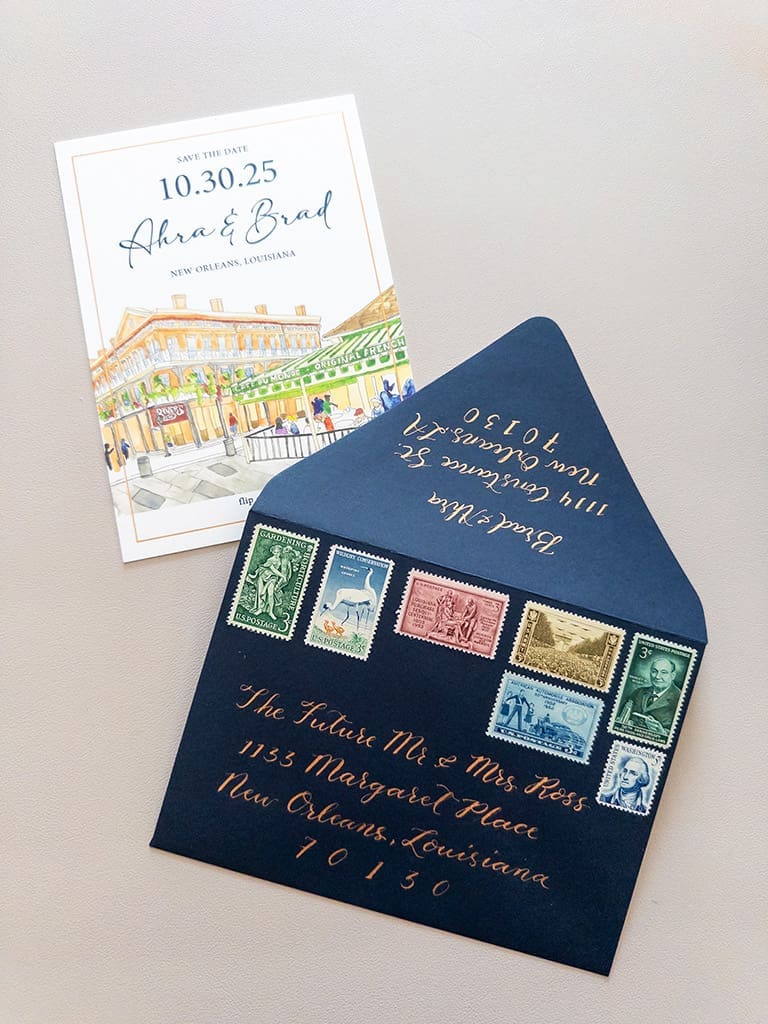 fully styled keepsake wedding invitation envelopes with dip pen calligraphy and vintage stamps